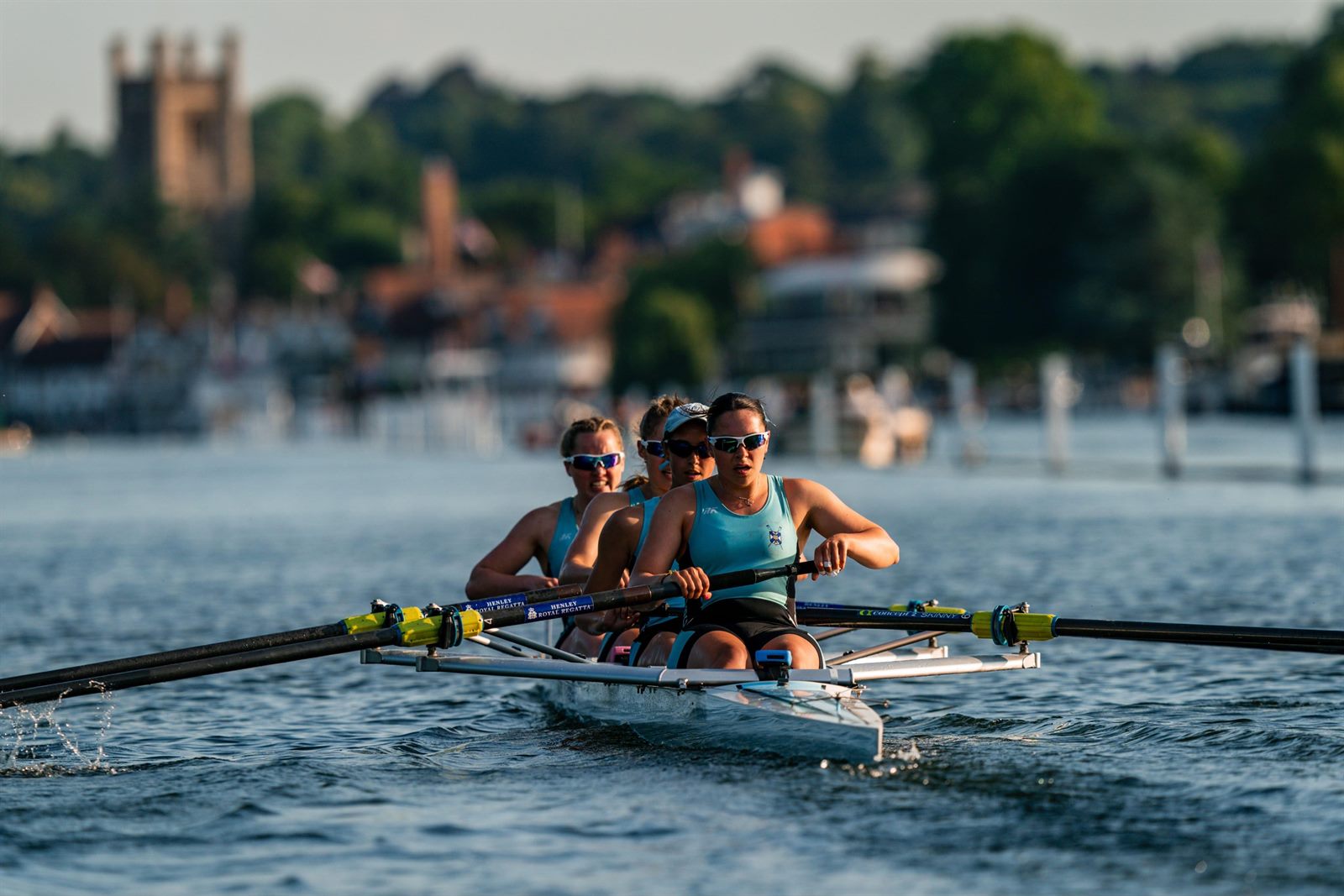 Georgia rowing in a coxless four on the river at Henley