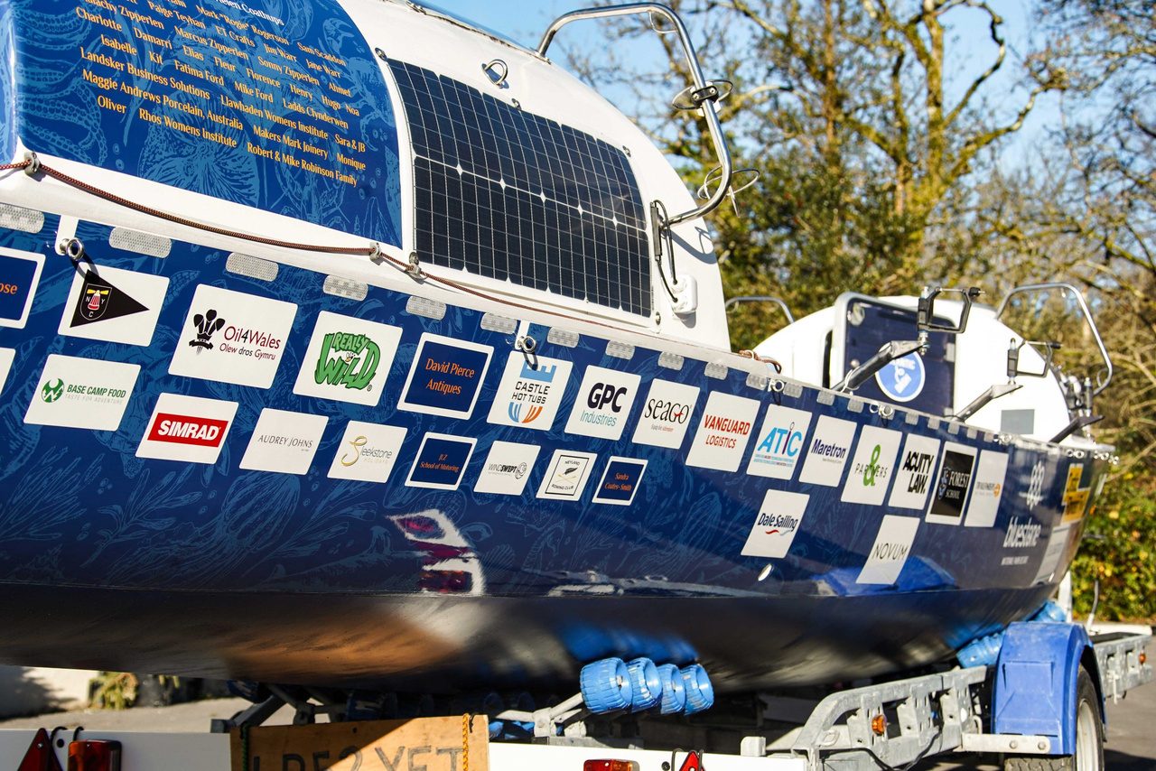 Sponsor logos on the hull of a previous Atlantic Dash boat